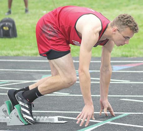 P.C.’s Jacob Lytle gets set for the start of the 200 m. dash finals. Lytle placed 2nd with a quick time of 23.84. Paula Jasa/Republican