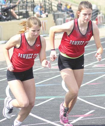 Pawnee City’s Mallory Branek (right) and Olivia Gottula (left) are off and running in the girls’ 3200 m. run. Paula Jasa/Republican