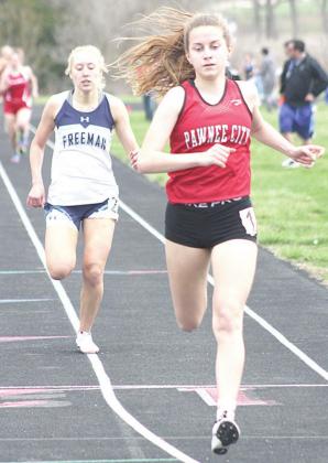 P.C.’s Emily Lytle finishes first in the girls’ 800 m. run clocked at 2:43.73. She also won the 1600 m. run. Paula Jasa/Republican