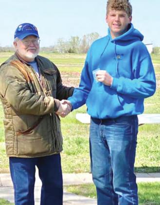 HTRS/P.C.’s Andrew Stalder (right) accepts his medal.