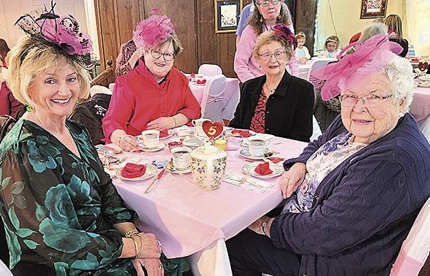 Wearing pink facinators are from let Michelle Tegtmeir, Carol Buzzard, Sherry Lovell and Esther Tegtmier.