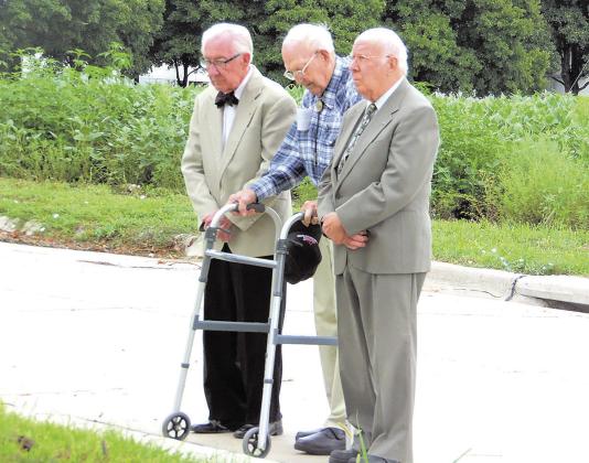 Eddie Hanna, Art Alderman and Willard Binder, standing together during 2016 burial services for their classmate, Joe Sochor. They and Joe all graduated from high school in 1945. Art left early to join the Navy. Eddie’s orchestra played for Table Rock’s impromptu victory dance. Years later, although I knew and talked with Eddie, Art, Willard, and Joe about those times, not one ever mentioned that enormous celebration.