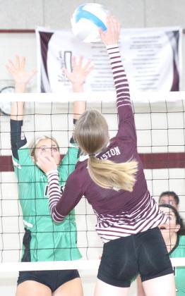 LHS’ Katelyn Sanders (pictured above right) goes up for a kill against FCSH in Thursday night action. Paula Jasa/Republican
