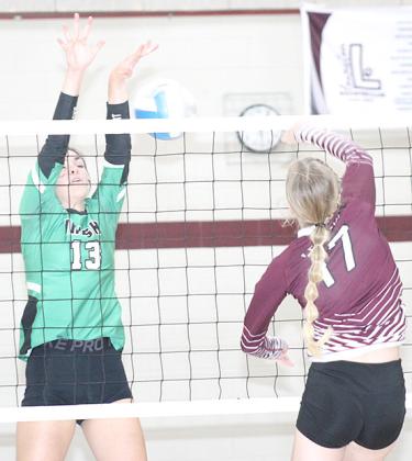 LHS’ Meagan Sanders (#17, right) led the Lady Tigers in kills against FCSH with 11 and had 4 blocks. Paula Jasa/Republican