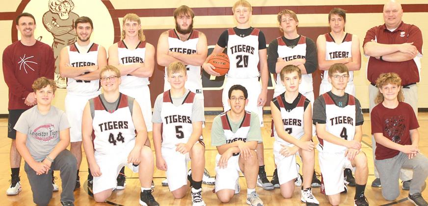 Members of the 2021-22 Lewiston Boys’ Basketball Team are front, from left: Brock Janssen, s.m., Jaxon Janssen, Everett Bohling, Draco Quintana, Ashton Sanders, Ethan Bohling, Grady Weyers, s.m. Back row: Head Coach Kohlton Gabehart, Brady Bledsaw, Tristen Ray, Ethan Horne, Caleb Rule, Ty Arena, Johnathan Burgett, Asst. Coach Matthew Sholty. Not pictured: Freddie McMurray.