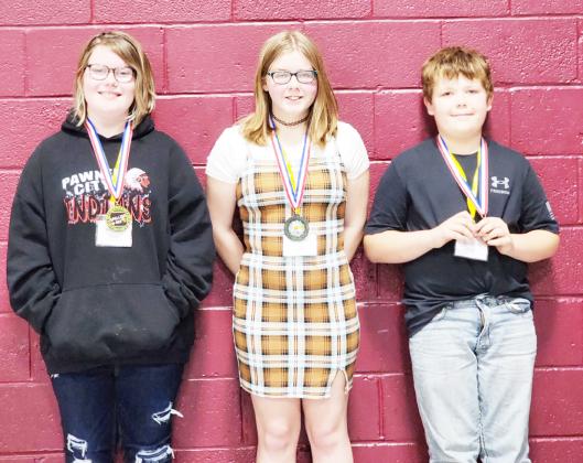 5th/6th Grade Division: (l to r) Isabella Seitz, Pawnee City, 1st place, Issabel Meyers, Lewiston, 2nd place, Corbin Crouse, Lewiston, 3rd place