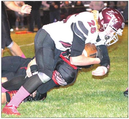LHS’ Tristen Ray (#25) pushes forward for more yardage against Pawnee City on Thursday night. Paula Jasa/Republican