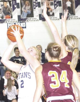 HTRS’ Elie Bstandig (#2, left) goes up for a rebound and putback against Sterling. Bstandig had 13 points and 12 rebounds for a double double against Sterling. Paula Jasa/Republican