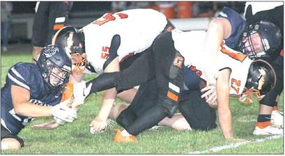 Titans hold on for tough Homecoming win over Griffins