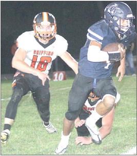 Titans hold on for tough Homecoming win over Griffins