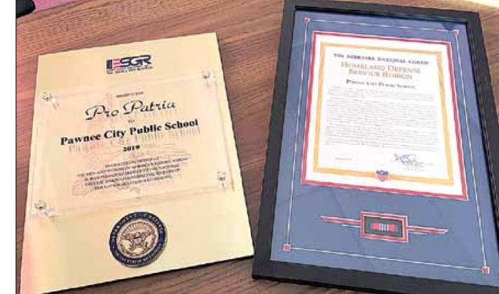 Pawnee City Schools award letter and plaque.