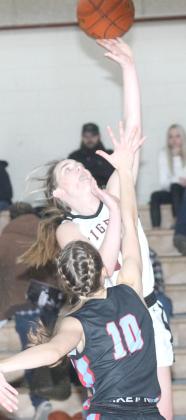 LHS’ Carleigh Weyers scores on another fast break layup against Cedar Bluffs. Weyers led Lewiston with 26 points against the Lady Wildcats. Paula Jasa/Republican