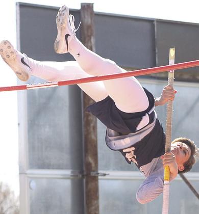 Paula Jasa/Republican HTRS’ Kameon Dettmann attempts to go up and over the bar in the boys’ Pole Vault event last Tuesday.