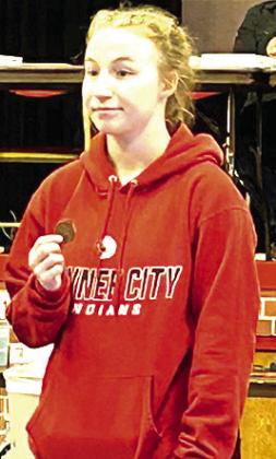 P.C.’s Kaylee Turnbull shows off her 3rd place medal at the Warcat Invitational last week. Photo courtesy of Jamie Maloley