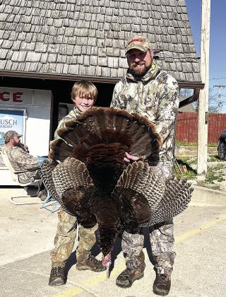 Colton Sedivy (left) and his dad pose with the second of Colton’s two birds- his biggest putting Colton in the lead of the Youth Division