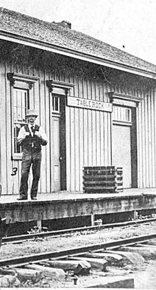 An amazing picture: C. W. Chambers at the depot in 1876, the year in which his stories took place! He was 23 years old. Photo from TR Historical Society