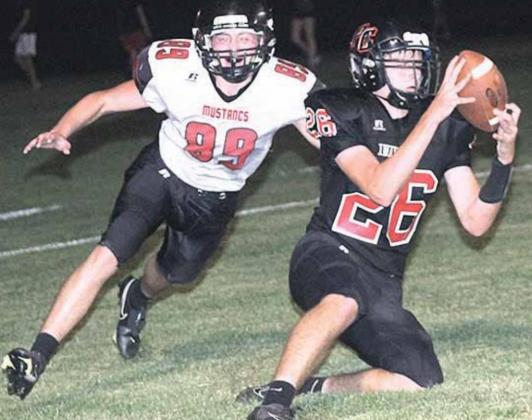 P.C.’s Bryce Gyhra (#26) makes a great catch for a PAT in one of three for the night. Paula Jasa/Republican