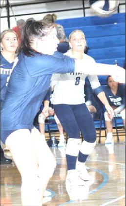 HTRS’ Hannah Koziol picks up a serve from FCSH as teammate Jaylie McNealy (#8, right) watches. Paula Jasa/Republican