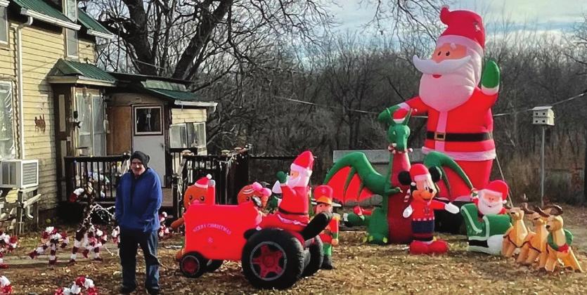 Chuck Habegger showing off his locally famous Christmas decorations Ray Kappel/Pawnee Republican