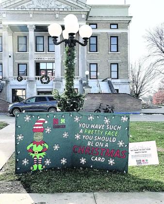 3rd place goes the the Extension Office for their Cute as a Christmas Card lamppost