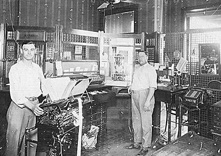 Above: Lawrence Duder &amp;amp; Guy Bonham behind the bank counter, circa 1924