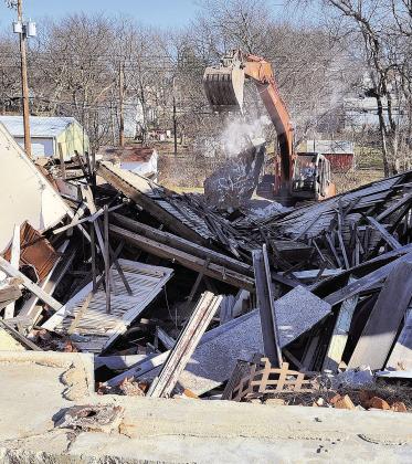 Inline Construction has begun demolition and cleanup of the collapsed buildings on G Street