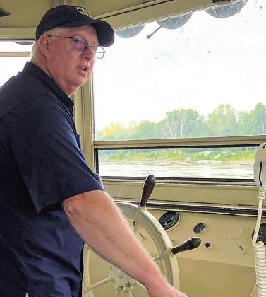 At the wheel, Captain James Smith, pilot of the Spirit of Brownville for many years. His unexpected death in January of this year left the future of the boat hazy