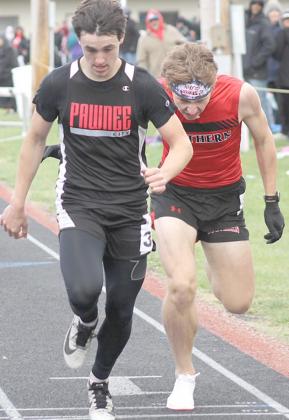 P.C.’s Jett Farwell edges W-S’s Kale Maguire at the finish line of the 800 M. Run. Farwell took the gold with a time of 2:11.62. Paula Jasa/Republican