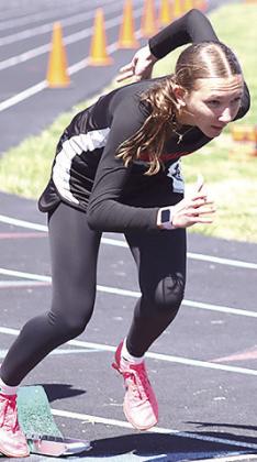 P.C.’s Kinsley Benson gets off to a quick start in the girls’ 400 M. Dash. She placed 6th with a time of 1:08.29. Paula Jasa/Republican