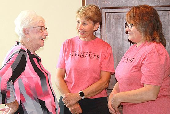 Cheryl Clement (left) takes time to visit with current owners Carol Schaardt (center) and Suzanne Borcher (right) during the Customer Appreciation Dinner.