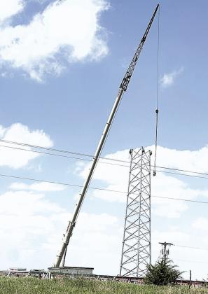 I caught this shot on the way to Beatrice May 14, 2025. I thought it was unique to capture a photo with 3(!!!) fellas so high up the tower! It was fun to zoom in and see that, indeed, they were men up there. (Or I guess there could be women up there as well). It’s not that zoomed in. Hee hee hee.