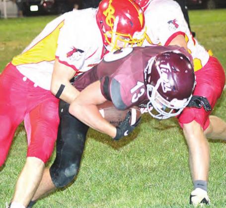 LHS’ Brady Bledsaw (#13) leans forward for more yardage in the Tigers’ Friday night season opener. Paula Jasa/Republican