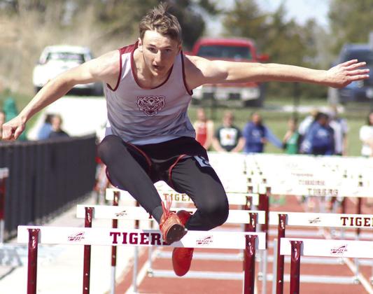 Lewiston’s Payton Heideman clears his final hurdle of the 110 M. event. Heideman finished 8th in this event, but placed 5th in the 300 M. hurdles clocked at 45.19. Paula Jasa/Republican