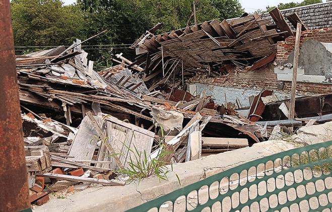 On April 1, 2025 a windstorm caused the final collapse of the building which stood between HealthFirst Pharmacy and the Union Bank on G Street in Pawnee City