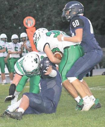 HTRS’ Jacob Joy (#80, right) brings down an Irish ball-carrier from the backside. Paula Jasa/Republican