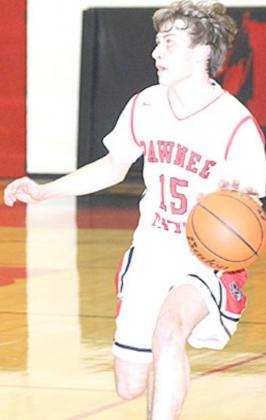 P.C.’s Kaden Lang (#15) brings the ball down the floor against Friend. Paula Jasa/Republican