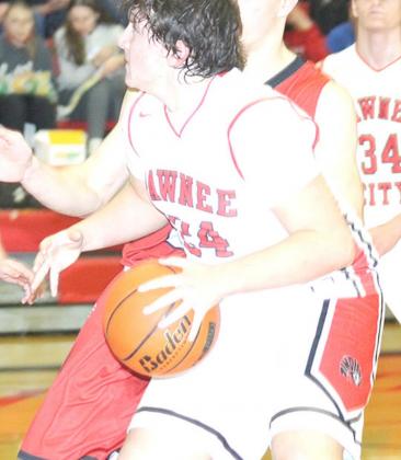 P.C.’s Joseph Marteney (#24) penetrates the lane against Friend. Paula Jasa/Republican