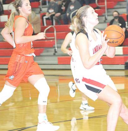 P.C’s Madison Branek (#25, right) pulls up for a shot against Diller/Odell. Branek scored 4 points in the game. Paula Jasa/Republican