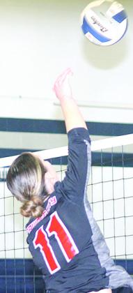 P.C.’s. Logan Maloley (#11) attacks at the net against Lewiston. Paula Jasa/Republican