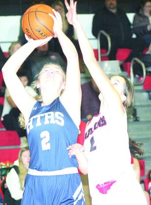HTRS’ Elie Bstandig (#2, left) tries to score from underneath as P.C.’s Emalyse Gottula (#2, right) defends. Paula Jasa/Republican