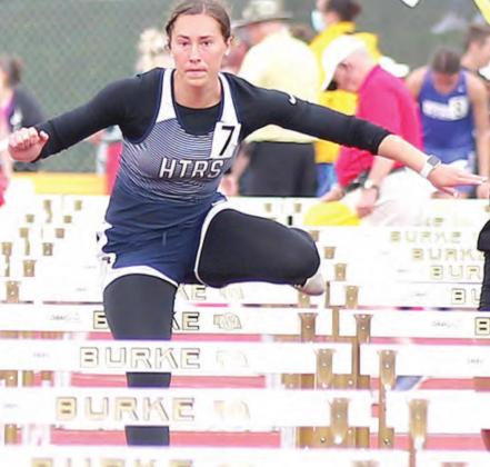 HTRS’ Natalie Novak clears a hurdle in the Class D girls’ 100 M. preliminary event on Wednesday. photo courtesy of Lorrie Novak