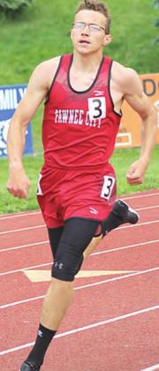 P.C.’s Jacob Lytle rounds the corner of the 400 M. Dash finals where he placed 4th at 52.19. Paula Jasa/Republican