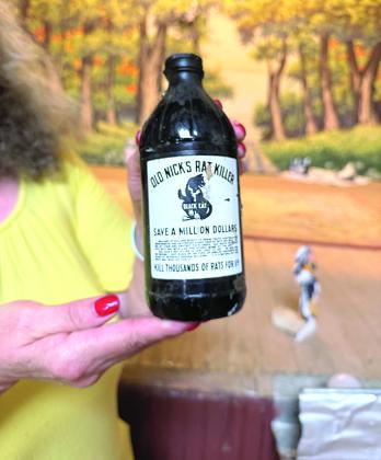 Above: Empty bottle of Old Nick’s Rat Killer found in an attic at the Table Rock Opera House. Manufactured in 1945, its label proclaims hits rats and mice like “the atomic bomb.”
