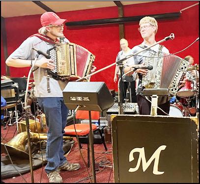 Trey plays George Janko's accordion at the 2022 Battle of the Polka Bands here. With him is Jake Vhylidal of the Mark Vhylidal Band, which was up against the band of Jim Kucera.