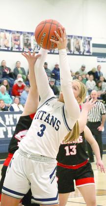 HTRS’ Laramie Glathar (#3) goes up for a rebound against Pawnee City last week. Glathar pulled in 9 rebounds in HTRS’ 69-21 win over Pawnee City. Paula Jasa/Republican
