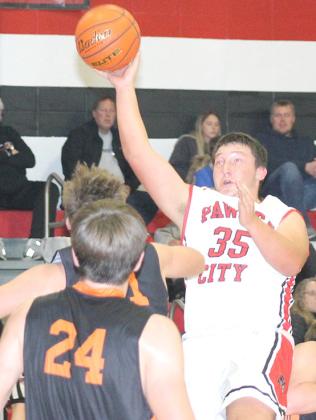 P.C.’s Joey Marteney (#35, right) makes one of several nice turn around shots against Diller/Odell. Paula Jasa/Republican