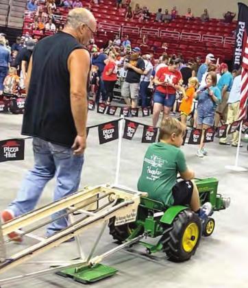 Above, Cooper Hunzeker competing in Tractor Pull