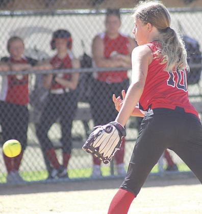 P.C.’s Kailyn Jensen (#10) delivers a pitch against Weeping Water on Sunday. Jensen collected 10 strike outs in the game which Pawnee City won 8-6. Paula Jasa/Republican