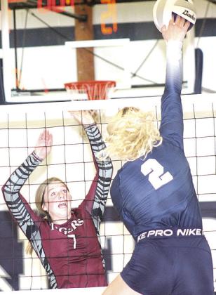 HTRS’ Elie Bstandig (#2, right) goes up high on the attack against LHS’ DeLanye Currie (#7, left). Paula Jasa/Republican