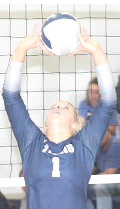 HTRS’ Laramie Glathar sets up the Lady Titan offense against FCSH. Paula Jasa/Republican